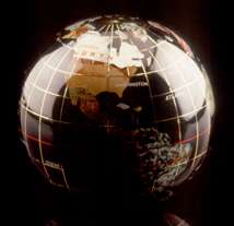 A globe with the world in it's center.